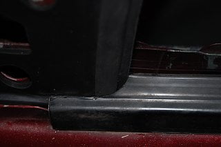 When I do get it overlapped there is the gap at the sill. This is with the hook at the bottom of the guide not attached.