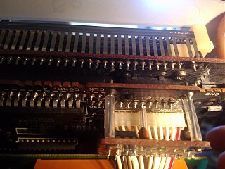 I remember resoldering several pins along the top row here, and the components on the bottom right board were in pretty bad shape (corroded and bad solder joints)